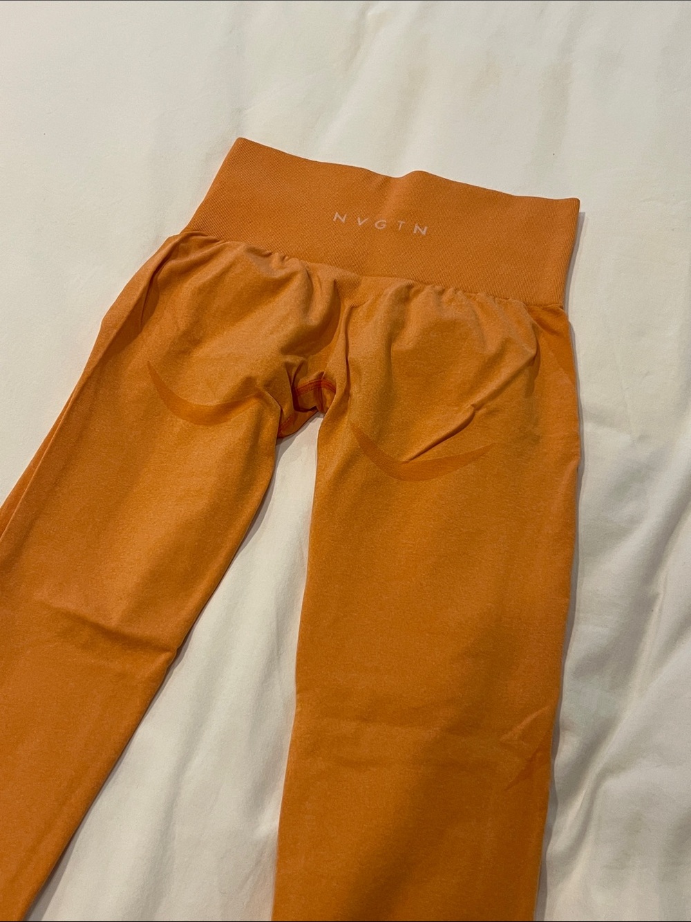 NVGTN Orange Leggings with Contour Seams